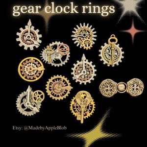 May include: A collection of gear clock rings featuring metallic gold, silver, and copper tones. The designs incorporate clock hands, gears, and keys. The text gear clock rings and Etsy: @MadebyAppleBlob are visible on the black background.