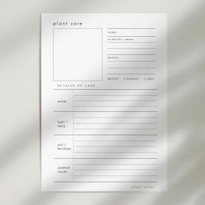 May include: A white plant care sheet with the words "plant care" at the top. The sheet includes sections for plant name, details, and care instructions. The words "paper plans" are at the bottom.
