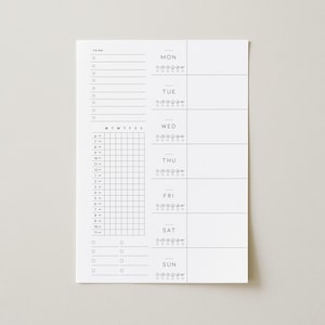 May include: A white weekly planner with a minimalist design. The planner includes sections for each day of the week, a to-do list, and a time-based schedule. The days of the week are labeled in a simple font, and there are small icons for each day.