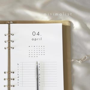May include: A minimalist planner page with the month of April displayed. The page includes a calendar, a section for birthdays, and a section for key dates. The word "minimalist" is at the top.