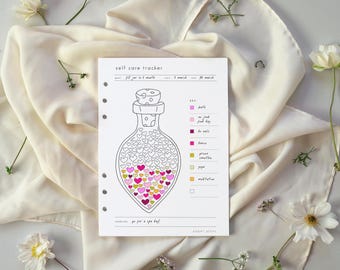 May include: A white self-care tracker with a bottle illustration filled with heart shapes in pink, yellow, and purple. The tracker includes a key for activities like baths, and meditation. The text "self care tracker" is at the top.