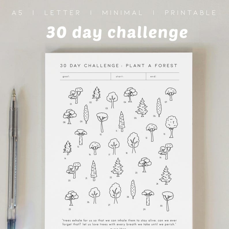 May include: A minimalist printable journal page with the text "30 day challenge" and the words "30 DAY CHALLENGE: PLANT A FOREST". The page features a grid of 30 numbered tree illustrations. A pen is visible on the left side.