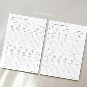 May include: Two white planner pages with quarterly overviews, featuring calendars for each month and lined sections for notes. The text "minimalist" is at the top, and "paper plans" is at the bottom. The pages are hole-punched for binder use.