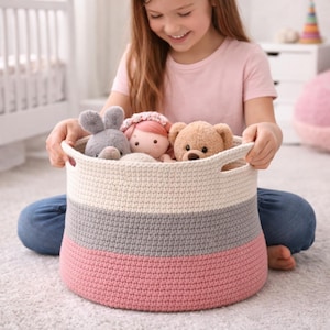 May include: A set of three ceramic mugs with a speckled, matte finish. The mugs are in shades of cream, light gray, and dark gray. Each mug has a simple, minimalist design, perfect for coffee or tea.