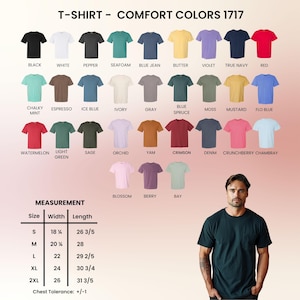 May include: A display of Comfort Colors 1717 t-shirts in various colors, including black, white, and red. The image also shows a size chart with measurements in inches, and a man wearing a dark green t-shirt.