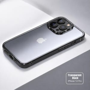 May include: A transparent black protective phone case for an iPhone 13 Pro. The case features a clear back panel, a dark tinted frame, and a raised square camera cutout with three circular lens openings and a flash sensor on the top right corner.
