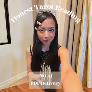 May include: Image of a person with long black hair, wearing a black top, and holding a deck of cards. The text "Honest Tarot Reading" is arched above the person's head. The text "NO AI PDF Delivery" is at the bottom.
