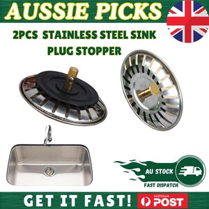 May include: Two stainless steel sink plug stoppers with a black rubber seal and brass stem. The image also shows a stainless steel sink and the text "AUSSIE PICKS", "2PCS STAINLESS STEEL SINK PLUG STOPPER", and "GET IT FAST!"