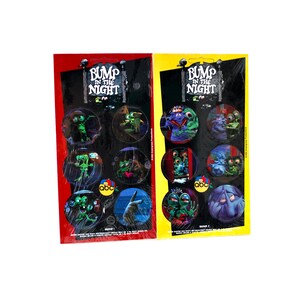 May include: Two sheets of stickers featuring characters from the children's television show "Bump in the Night". The stickers are round and feature different characters from the show, including a green monster, a purple monster, and a blue monster. The stickers are on a white background.