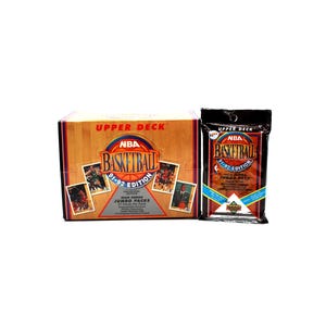 May include: A box and a pack of Upper Deck NBA Basketball 91-92 Edition trading cards. The box is brown with the NBA Basketball logo and images of basketball players. The pack is black with the same logo.