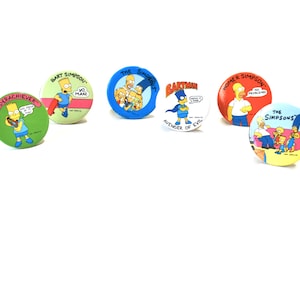 Simpsons Button Collection Set of 6 New Old Stock Bart, Homer, Marge, Lisa, & Maggie