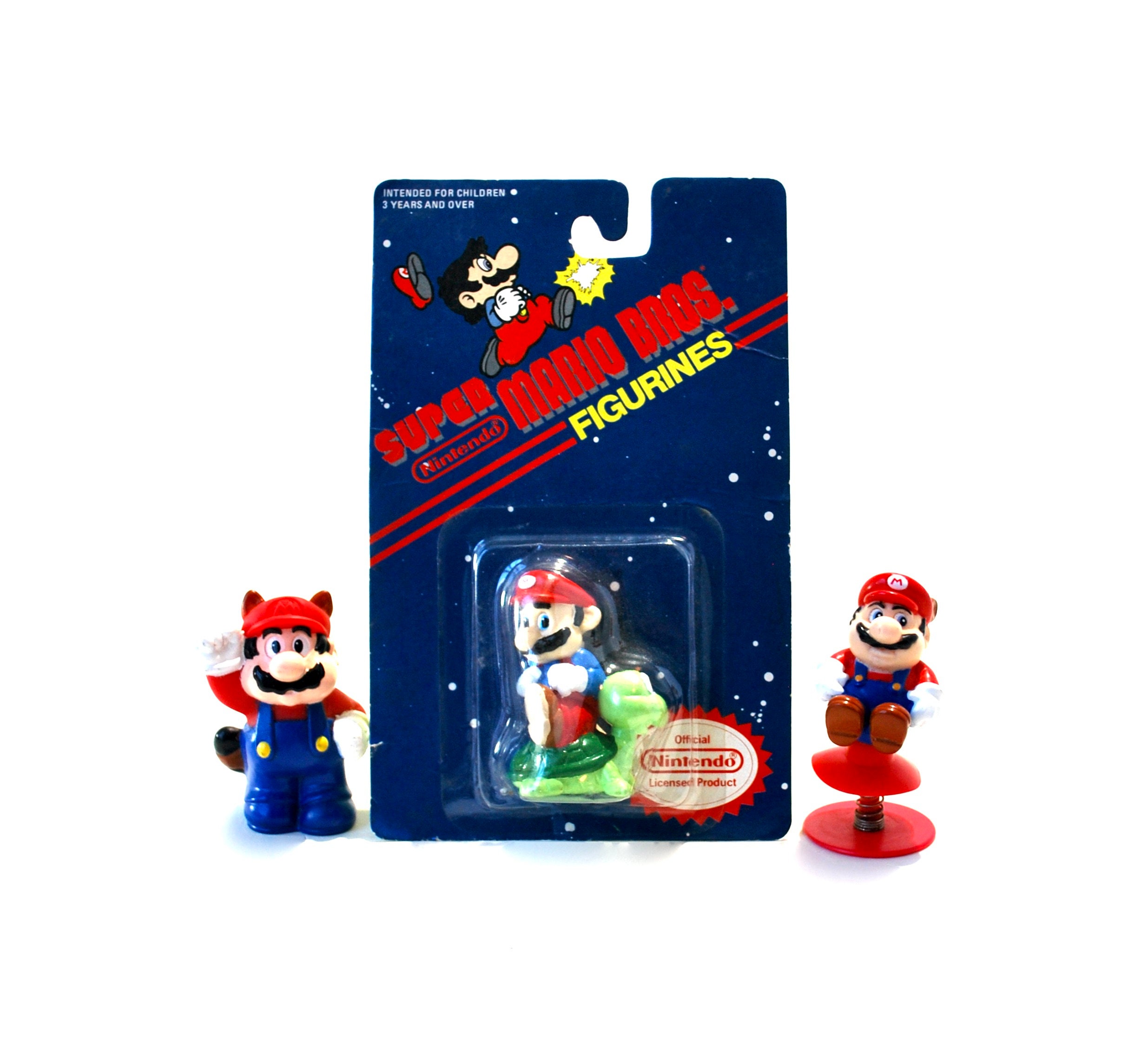 Super Mario - Figurine Mario Raccoon + feuille - Produits dérivés