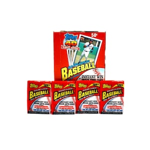 May include: A collection of 1991 Topps Major League Baseball cards. The image shows a box of cards with the Topps logo and a baseball player image, along with four individual packs. The packs and box are red, white, and yellow.