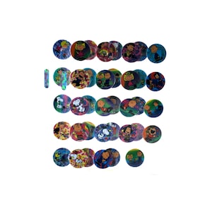 May include: A collection of colorful, round, holographic stickers featuring characters from the Peanuts comic strip. The stickers showcase various characters in different poses and settings, with vibrant, iridescent backgrounds.