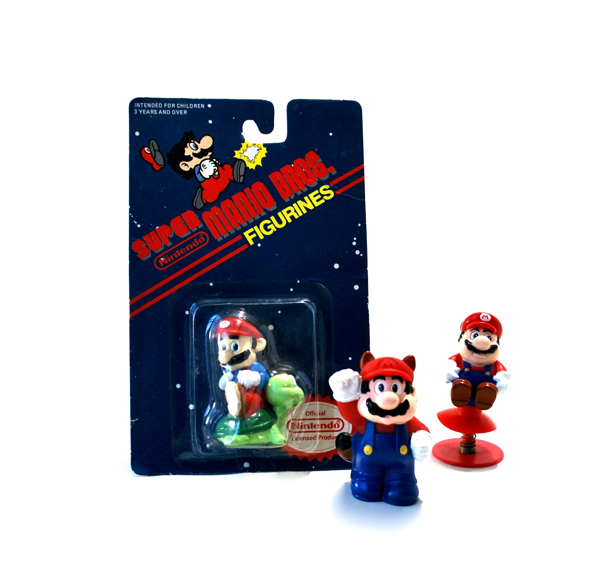 Super Mario - Figurine Mario Raccoon + feuille - Produits dérivés