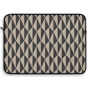 May include: A rectangular laptop sleeve featuring a repeating geometric pattern of dark charcoal gray and light beige diamonds. The sleeve has a black zipper closure along the top edge and rounded corners, providing a structured protective case.