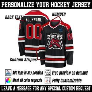 May include: Black hockey jersey with red and white accents. Features customizable text, numbers, and a custom logo. Includes the text "PERSONALIZE YOUR HOCKEY JERSEY", "YOURNAME", "CUSTOM LOGO", and "LEAVE A MESSAGE FOR ANY SPECIAL CUSTOM REQUEST".