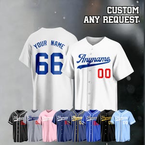 May include: White baseball jerseys with custom text and numbers. One jersey has "Anyname" and "00" in red. Another has "Your Name" and "66" in blue. Additional jerseys in various colours are displayed below. The text "CUSTOM ANY REQUEST" is at the top.