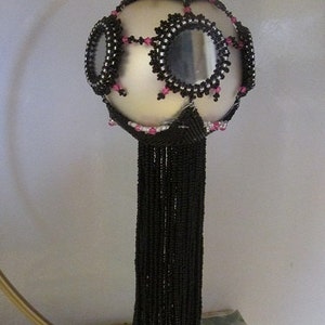 Specchio specchio sulla copertura dell&#39;ornamento di perline a sfera e-pattern