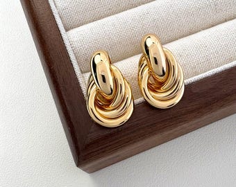 Interlocking Knot Gold Earrings: 18 K Twisted Rope Hoops