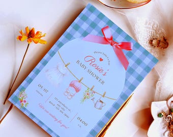 Invitación para baby shower, vestido rosa con lazo para niña, plantilla editable e imprimible en Canva.