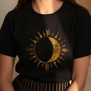 Unisex organic cotton T-shirt featuring a gold textured sun and moon celestial design on the chest. Astrology-inspired minimalist shirt. Boho witchy aesthetic.