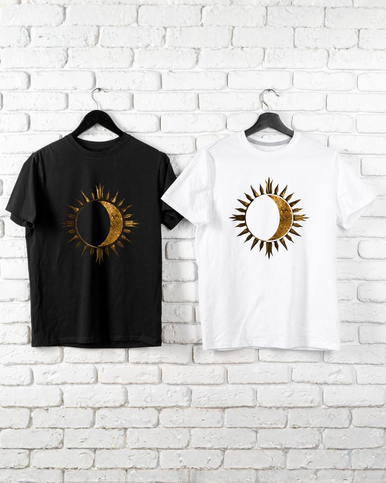 Black and white T-shirts with gold sun and moon chest print. Cosmic celestial theme. Minimalist boho astrology design gift.