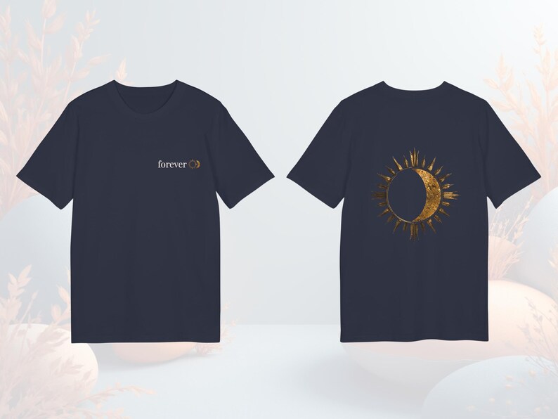 Navy blue celestial astrology tee with gold-effect sun and moon design, unisex fit.