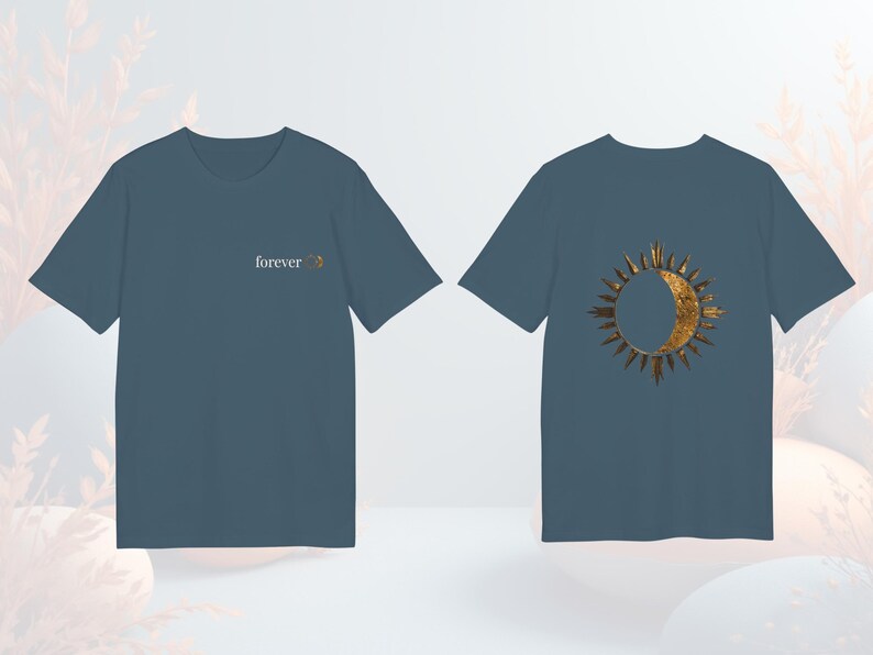 Sky blue celestial astrology tee with gold-effect sun and moon design, unisex fit.