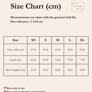 Size chart showing the size of an 100% organic cotton t-shirt with celestial sun and Moon minimalist print.