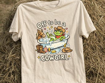 Maglietta con disegno di una cowgirl rana nella vasca da bagno, umorismo western.