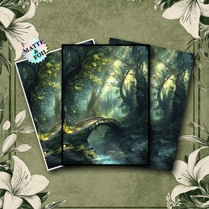 May include: Three art prints depicting a tranquil forest scene with a stone bridge over a stream. The prints have a matte and foil finish, with verdant trees and sunlight filtering through the canopy. The prints are displayed on a green background with floral accents.