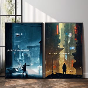 May include: Two framed Blade Runner film posters. The left poster is a blue cityscape with a futuristic car and a figure holding a gun. The right poster is a cityscape with a figure in a long coat.