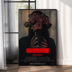 May include: A framed movie poster for "Obsession" featuring a dark silhouette holding a vase of red roses. The title is in red, with the text "Be careful who you wish for." and "Only in theaters May 15."