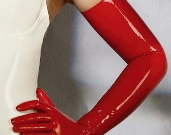 May include: A pair of long, bright red opera-length gloves with a high-gloss, patent-like finish. The gloves extend past the elbow, featuring a smooth, seamless construction that covers the entire arm and hand with a vibrant, reflective red surface.