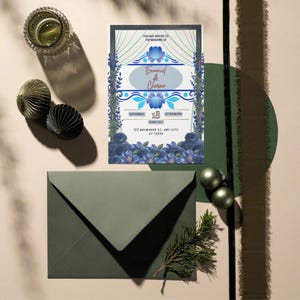 May include: A wedding invitation with blue floral accents and the names "Bernard & Chelsea" in a decorative font. The invitation is surrounded by a green envelope, decorative orbs, and a sprig of greenery. The invitation includes the date and time.
