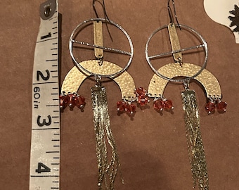 Long and light Jazzy hoop STATEMENT earrings. Genuine padparadscha Swarovski crystals. Two-tone metals! Tangerine crystals