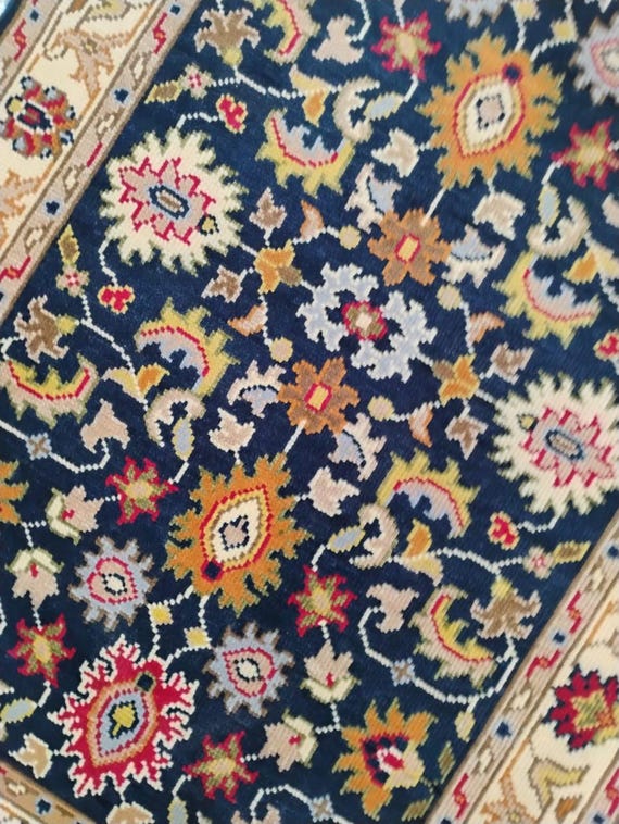 Handmade Wool Oriental Rug: Navy, Red, and Gold Persian Style