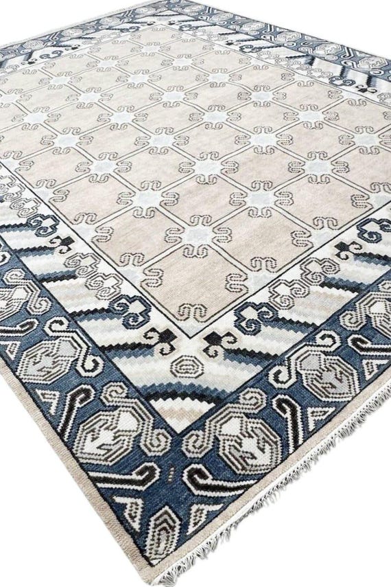Handmade Wool Area Rug: Beige & Navy Geometric Tribal Design