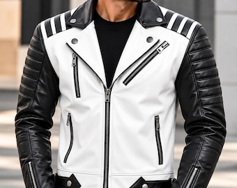 Puede incluir: Una chaqueta de moto blanca y negra con torso blanco, mangas negras con detalles acolchados, solapa de muesca, cremalleras metálicas plateadas en el pecho y los puños, y detalles de cuero negro con broches plateados en la cintura.