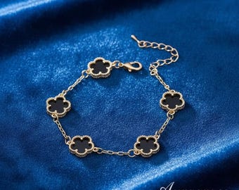 Dainty Gold Clover Bracelet, Black Enamel Floral Motifs, Adjustable Chain Jewelry