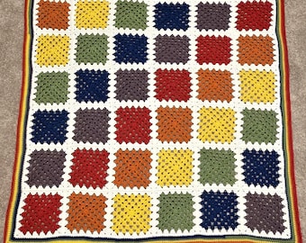 Manta de bebé de crochet con cuadrados de la abuela arcoíris: decoración colorida para la habitación de tu bebé