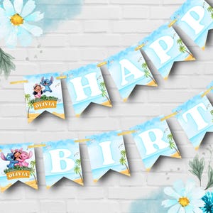 May include: A blue and white banner with the words "HAPPY BIRTHDAY OLIVIA" printed on it. The banner features a beach scene with palm trees and cartoon characters. The banner is strung with gold string.