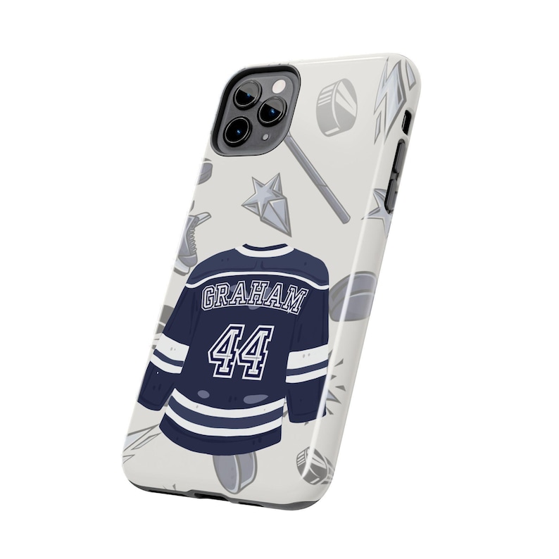 Cream iPhone 11 Pro angled product shot Graham 44 navy hockey jersey pattern on white background