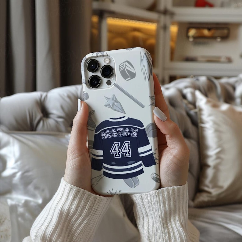 Garrett Graham phone case cream iPhone Pro navy number 44 hockey jersey pattern, two hands cream knit luxury sofa