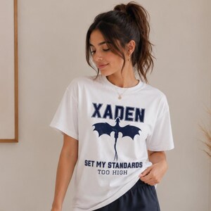 Lifestyle photoshoot woman in Xaden Riorson fantasy white tshirt - bookish gift for her- romantasy shirt