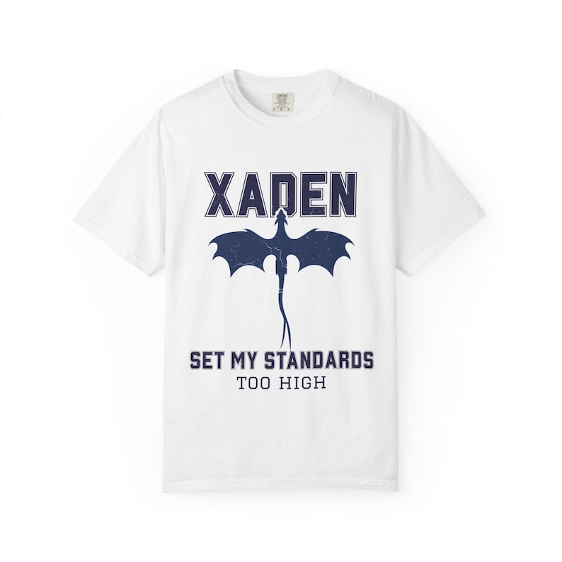 Xaden Riorson shirt white tee close-up navy dragon print, standing model in light wash jeans