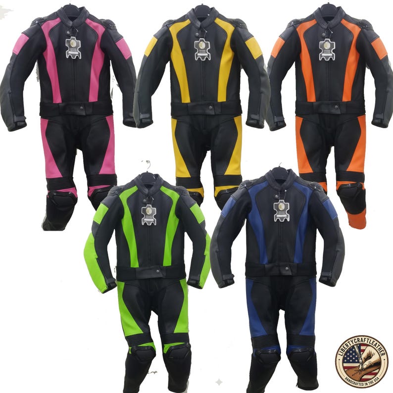 May include: Five black leather motorcycle suits with colored accents in pink, yellow, orange, green, and blue. Each suit has a matching jacket and pants, with protective padding on the knees and elbows. The suits are displayed on hangers.