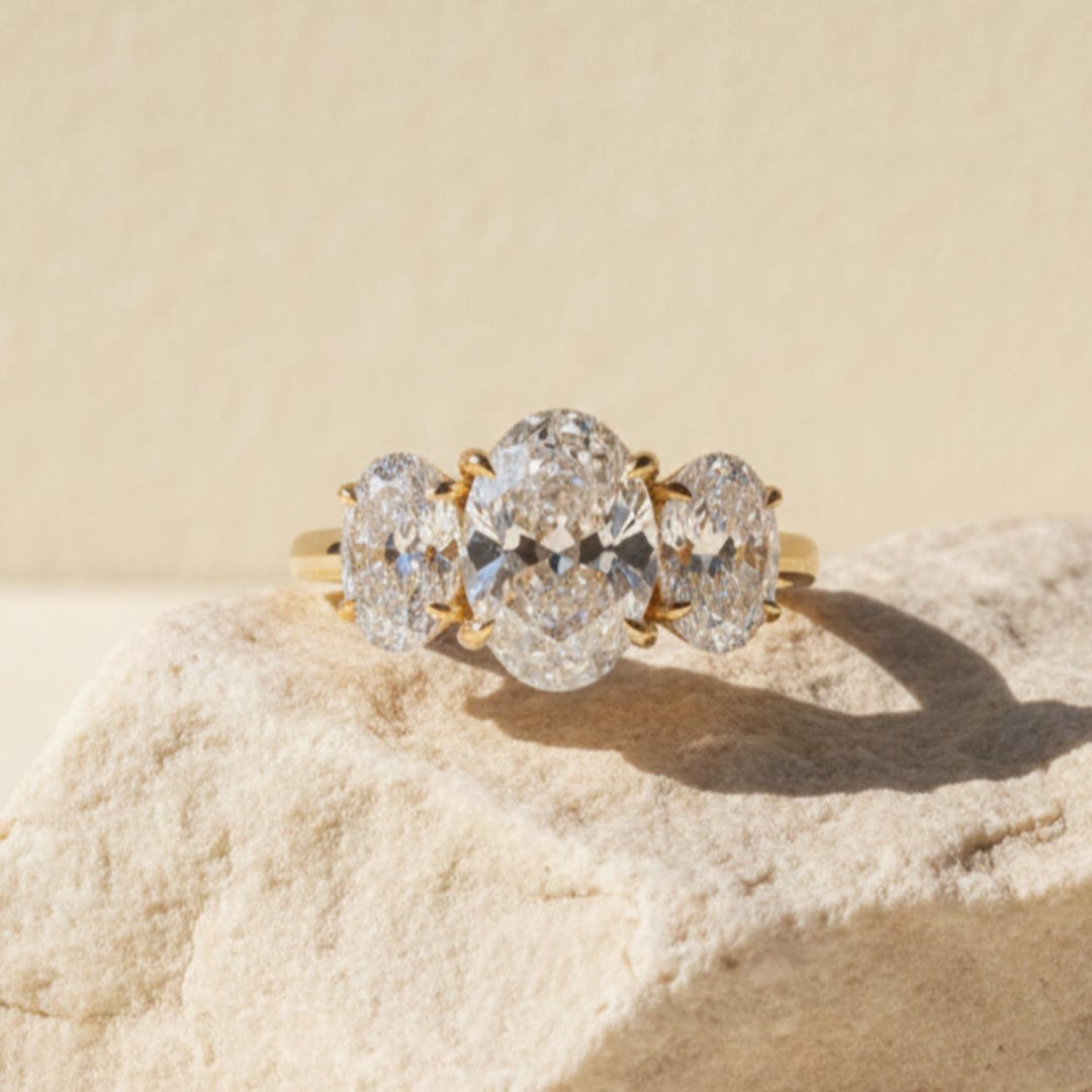 14K Gold Three Stone Oval Moissanite Engagement Ring | Timeless Jewelry ...