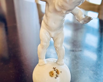 Karl Tutter / Hutschenreuther “Putto on Ball” Porcelain Figurine